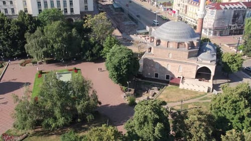 Tilt-up reveal shot of islamic mosque in city of Sofia, Bulgaria