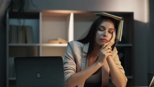 Woman Naps at Desk then Works on Laptop