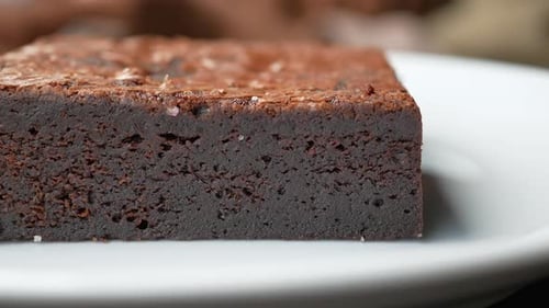Delicious Brownie with Chocolate Crust on a Plate