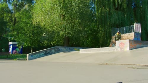 Skater performing tricks in a vibrant skate park