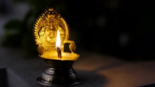Ornate Oil Lamp Glowing in the Darkness