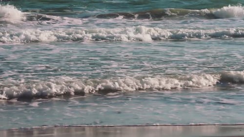 Foam and ocean waves close up