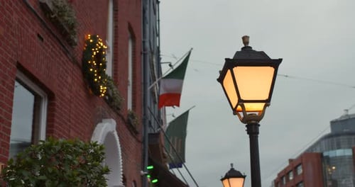 Typical Vintage Streetlamp On The Urban Streets In Dublin, Ireland. Low Angle Shot