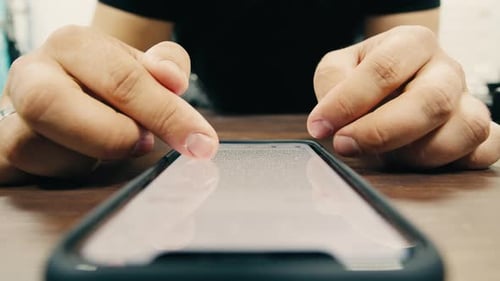 Man Chatting Online on Phone Smartphone Macro Close Up Typing Text Message Touching Touchscreen