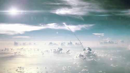 Space Rocket Launching Through Clouds