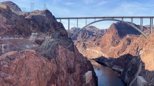 A Picturesque Scene Beautifully Showcasing the Magnificent Hoover Dam Along with Its Impressive