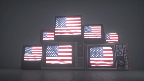 Waving American Flag Displayed on Stack of Retro Televisions
