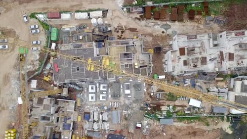Large residential construction site with cranes, Aerial view