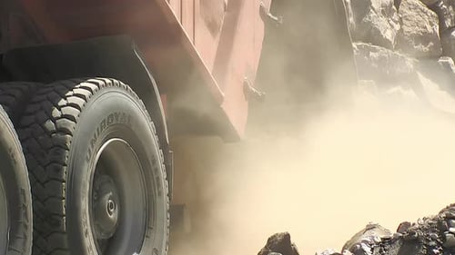 Truck Unloading Stones