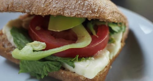 Mouth Watering Sandwich on Plate Close Up