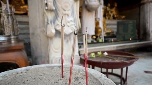 burning incense in a buddhist temple