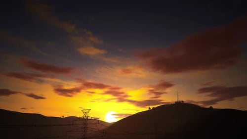 High Voltage Electricity Tower On Mountains At Sunset. 4K Time Lapse Of Sunset