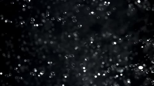 Splashes of Water Filmed on a Highspeed Camera at 1000 Fps