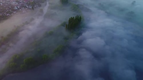 Morning Dense Fog Over the River with the Park