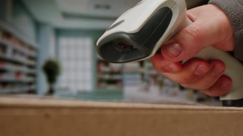 Scanner Scan Delivery Box in Storage Ecommerce Shop Man Packing Goods and Clothes Second Hand