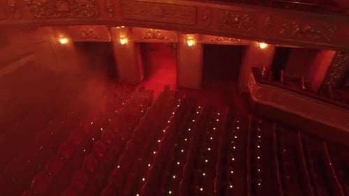 interior of the theater in Los Angeles, Georgia, USA. red chair dim lights.
