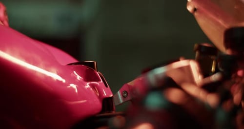 Crop Hand in Glove on Motorcycle