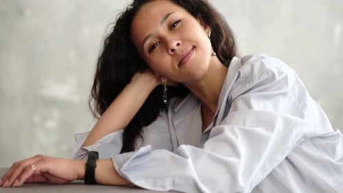Close Up Portrait of African Woman at Home Enjoying Morning in Living Room