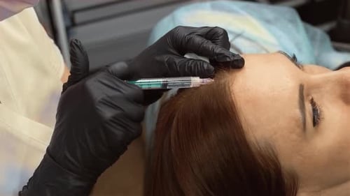 Woman Receives Scalp Injection in Clinic for Hair Loss