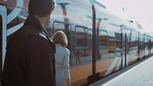 Man See Girlfriend Off on Railway Station
