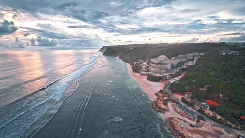 Sunset Over The Beach And Ocean Aerial