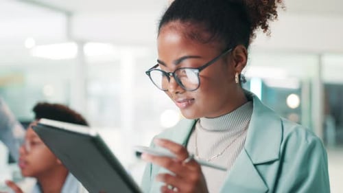 Woman, software developer and writing with tablet for UI testing, UX or app development at office