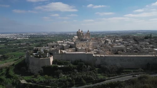 Aerial video of the walled city of St Paul's Cathedral, Malta