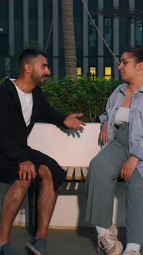 Meeting Friends on the Street Media A Beautiful Couple of Men and Women in Fashionable Clothes Who