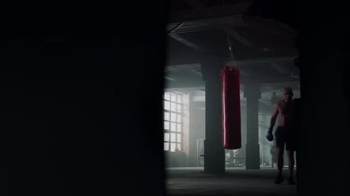 Sport Man Finishing Boxing Training in Fighting Club. Male Boxer Walking In