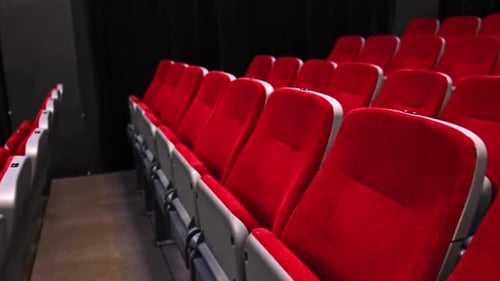 Rows Of Red Chairs In Concert Hall