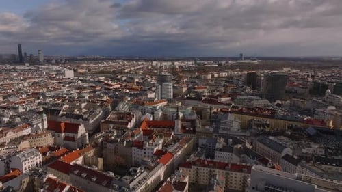 Beautiful Aerial Panoramic Footage of Metropolis at Golden Hour Buildings in Urban Borough Lit By
