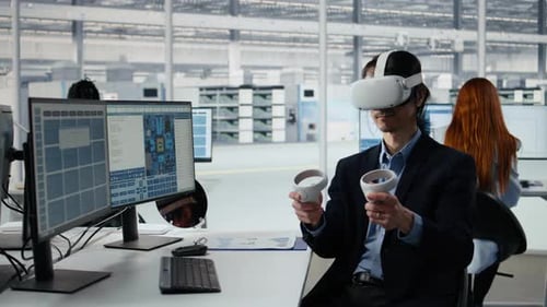 Man in RD Office Using VR Headset to Design Energy Efficient Semiconductors