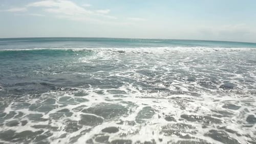 Drone low fly over big ocean waves amazing dreamland for surfers. Waves foaming and crushing fast on