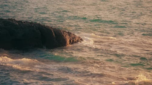 Sunset Sea meets Rocks - 2K