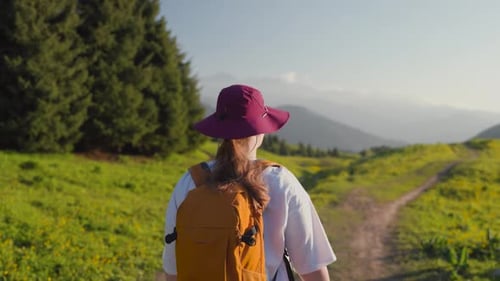 Woman Hiker in the Forest Mountain