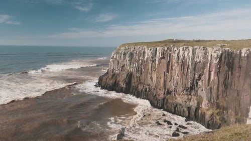 Waves crashing on high brazilian cliffs on atlantic ocean, Guarita Park, Brazilian Conservation Unit