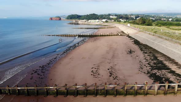 Aerial View Above Wooden Groynes At Dawlish Warren Beach Dolly Forward aerial-view-above-wooden-groynes-at-dawlish-warren-beach-dolly-forward