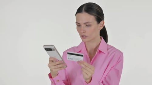 Confused Woman with Phone and Credit Card