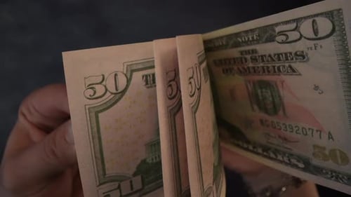 Banknotes are Counted with Fingers