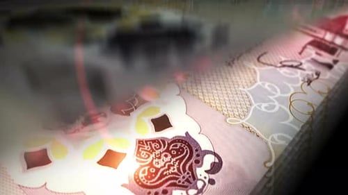 Boucle fluide de comptage des dinars libyens