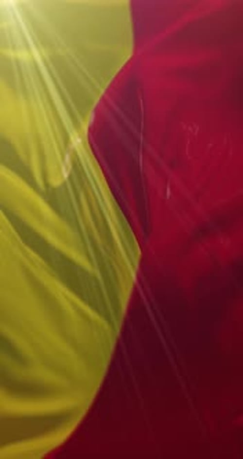 Dynamic Waving Fabric in Yellow and Red with Sun Rays