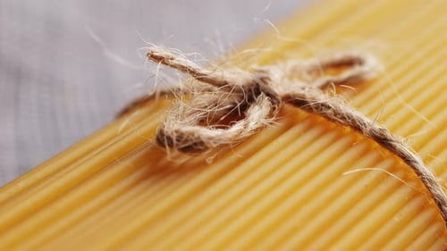 Italian Spaghetti or Noodle Macaroni Pasta Raw Food Background or Texture Close Up