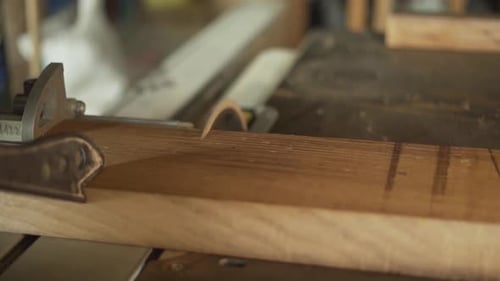 Carpenter Precision Cutting Wood Using a Circular Table Saw