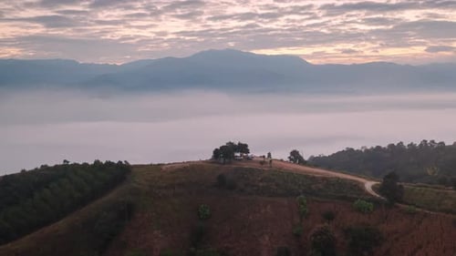 Hyperlapse by Drone Beautiful landscape of fog, mist, and cloudscape in the morning forest.