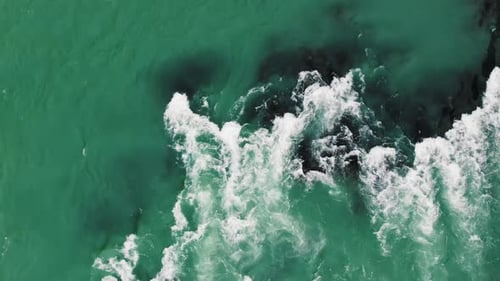 Top Down View of a Turquoise Mountain River with a Fast Flow