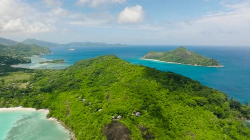 Lush Green Island Surrounded By Turquoise Waters Seychelles Mahe