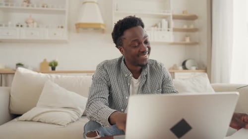 Portrait of Happy Freelancer Working with Computer at Home Office Black Man African American Male