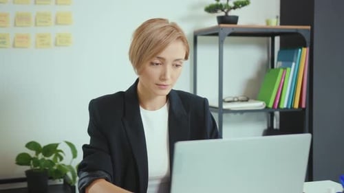 Portrait Businesswoman Working in the Office Sitting at Desk Use Laptop Look at Camera Computer