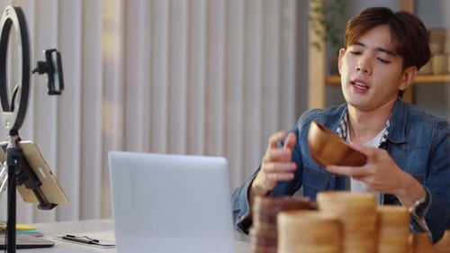 Young Man Presenting Wooden Bowl Online
