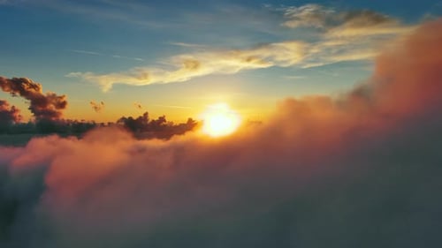 Aerial View of Clouds and Sunset Sun
